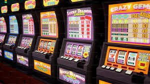 Filipino player browsing Rich Queen game lobby on mobile phone
